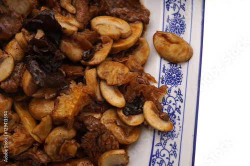Veal with black and white mushrooms and bamboo shoots