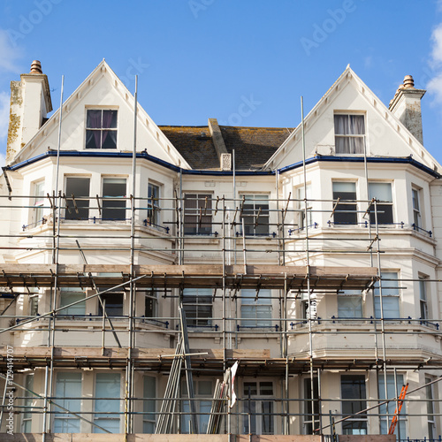 English victorian house with scaffolding around it, selective focus