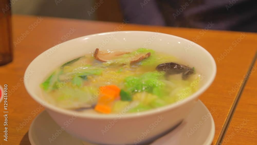 a hot bowl of vegetarian Japanese noodle soup a hot bowl of vegetarian Japanese noodle soup