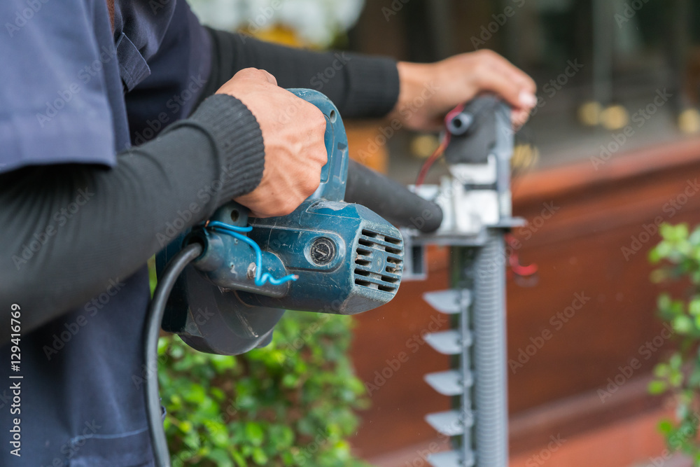 Workers use blowers
