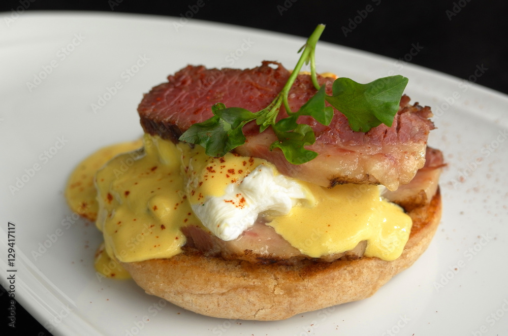 Close up of corned beef benedict. Selective focus.
