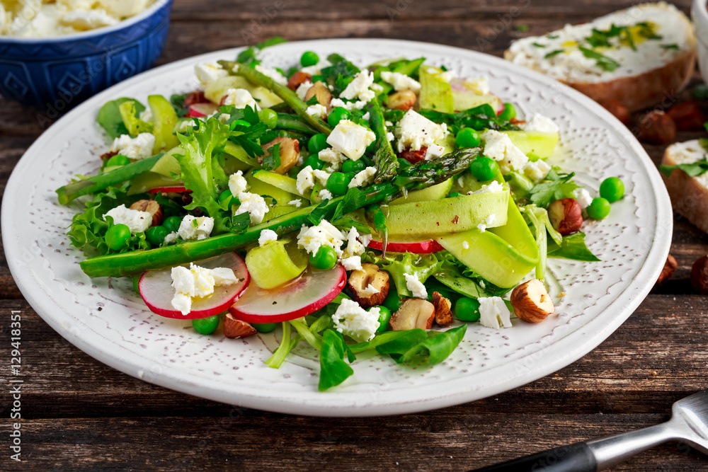 Fresh Green Asparagus salad witch Goat Cheese, peas, radishe, zucchini, lettuce and Hazelnuts. Fresh Green Asparagus salad witch Goat Cheese, peas, radishe, zucchini, lettuce and Hazelnuts.