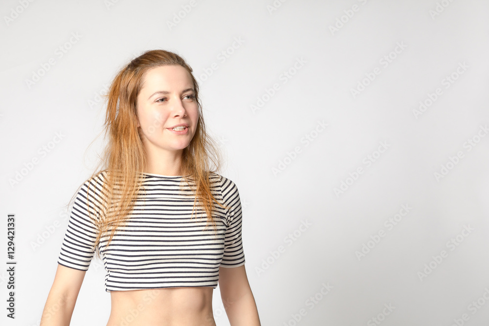 Portrait of caucasian young purposeful enthusiastic woman with an active lifestyle. Studio shot, copy space. Portrait of caucasian young purposeful enthusiastic woman with an active lifestyle. Studio shot, copy space.