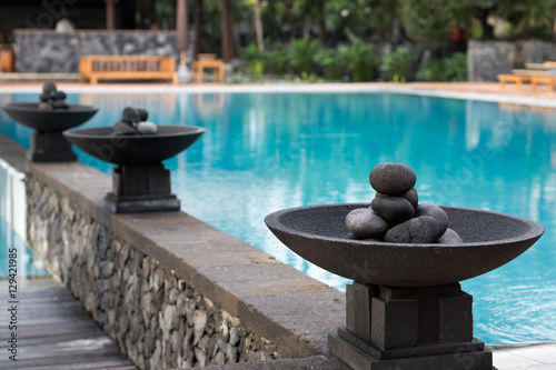 fireplace by the pool in hotel