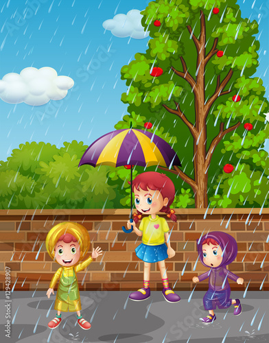 Fototapeta Naklejka Na Ścianę i Meble -  Rainy season with three kids in the rain