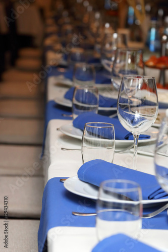 serving banquet table in a restaurant in blue and white style
