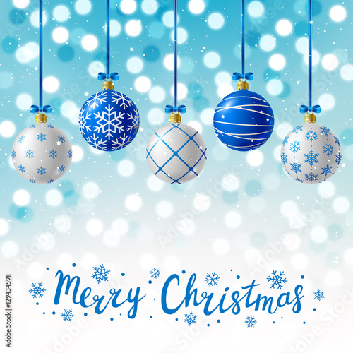 Blue Christmas balls on shiny background