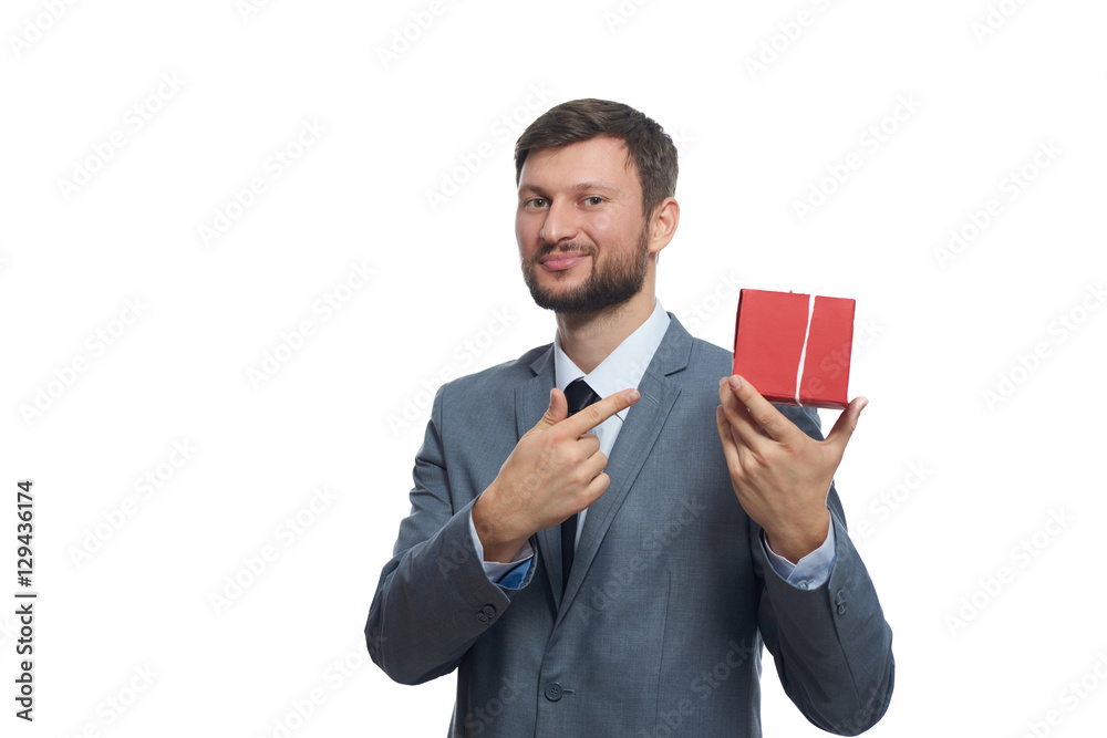 Bearded businessman holding a present Bearded businessman holding a present