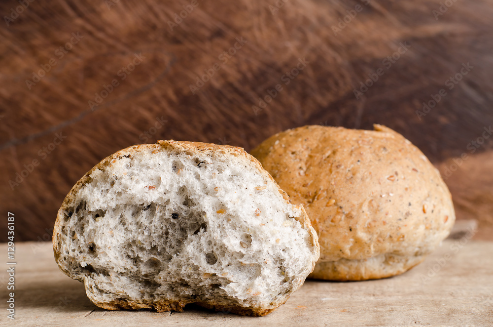Whole wheat bread on wooden background,meal or breakfast Whole wheat bread on wooden background,meal or breakfast