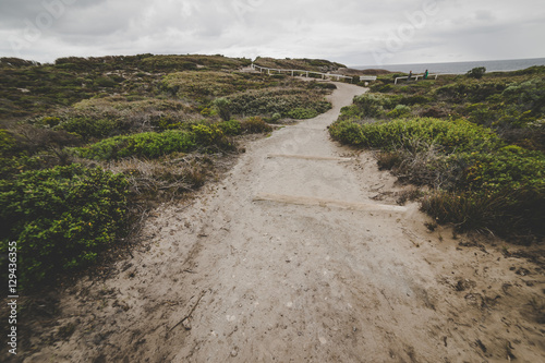 Steps leading down to beach at Torndirrup National Park, Albany, Western Australia, Australia.vintage toning  filter add . photo