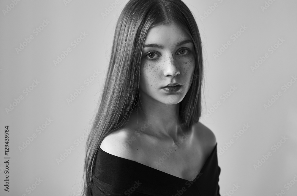 Dramatic black and white portrait of a beautiful lonely girl with ...