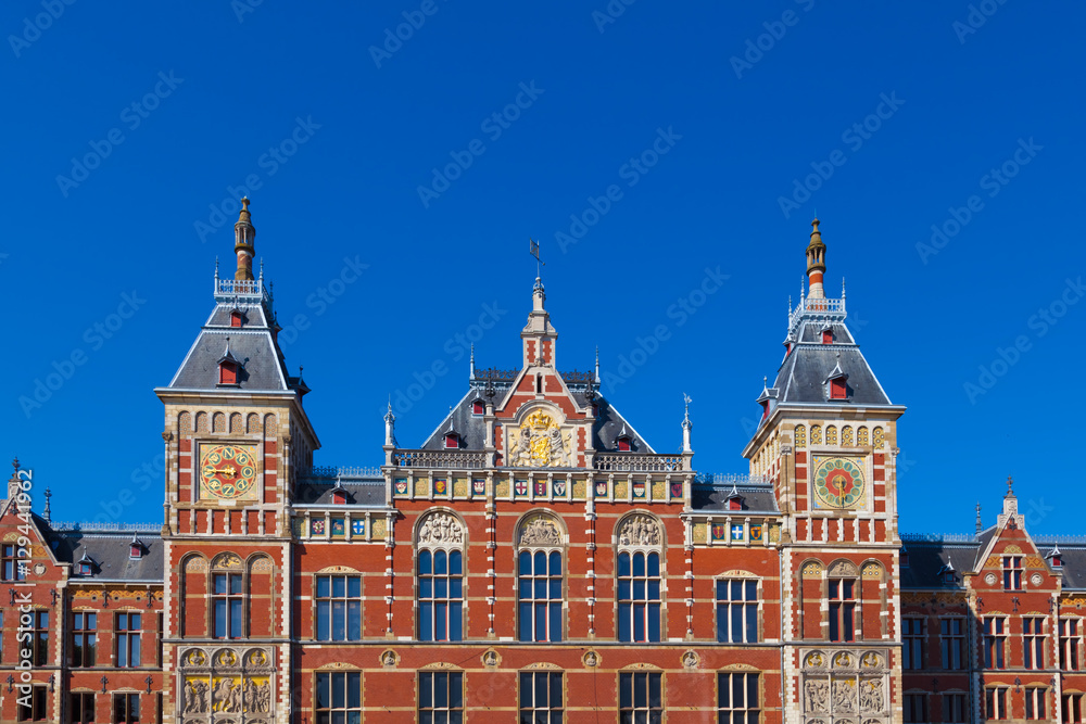 Facade of the Central Railway Station in Amsterdam, Netherlands