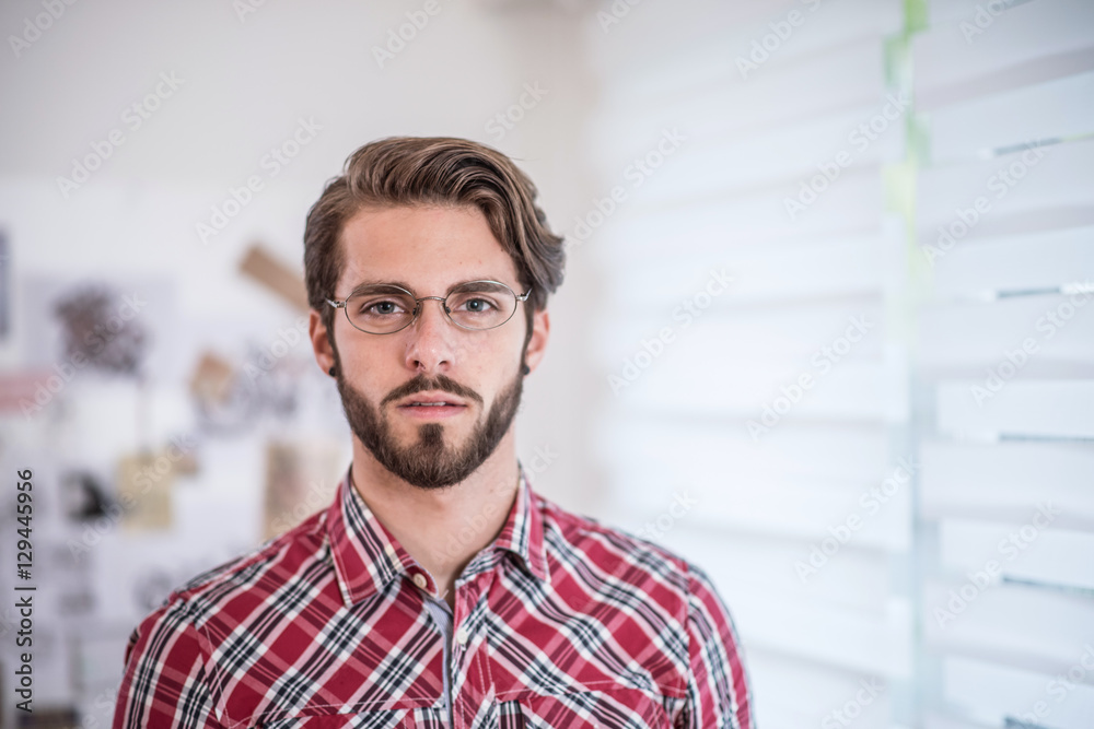 Portrait of a young trendy man wearing glasses Portrait of a young trendy man wearing glasses