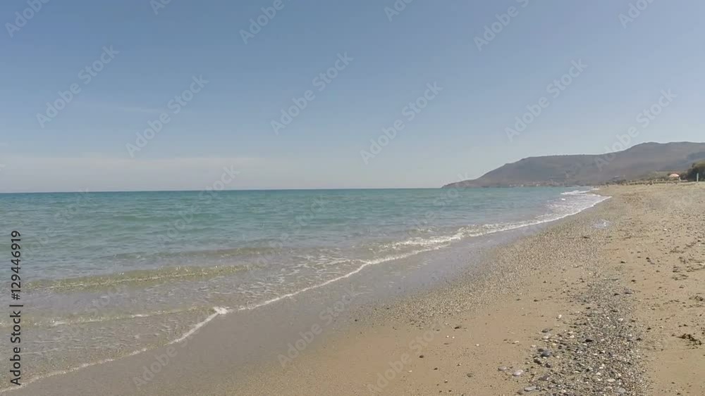 Soft wave of blue sea on sandy beach. Background Soft wave of blue sea on sandy beach. Background