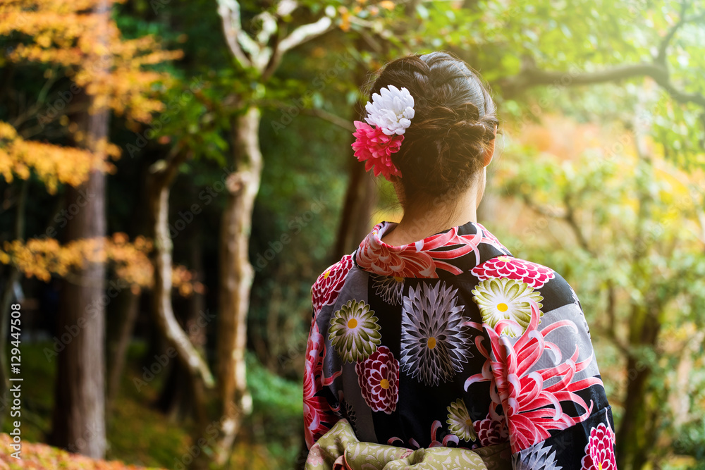 Japanese kimono girl enjoy autumn color at sunset Japanese kimono girl enjoy autumn color at sunset