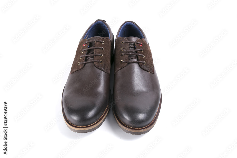 male shoes in brown leather on white background, isolated product, top view male shoes in brown leather on white background, isolated product, top view