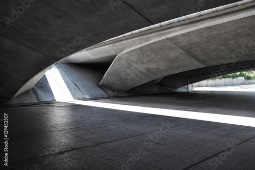 Under the concrete architecture bridge with light and shadow. photo