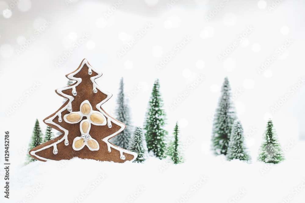 Snowy Winter Forest with gingerbread christmas tree . Snowy Winter Forest with gingerbread christmas tree .