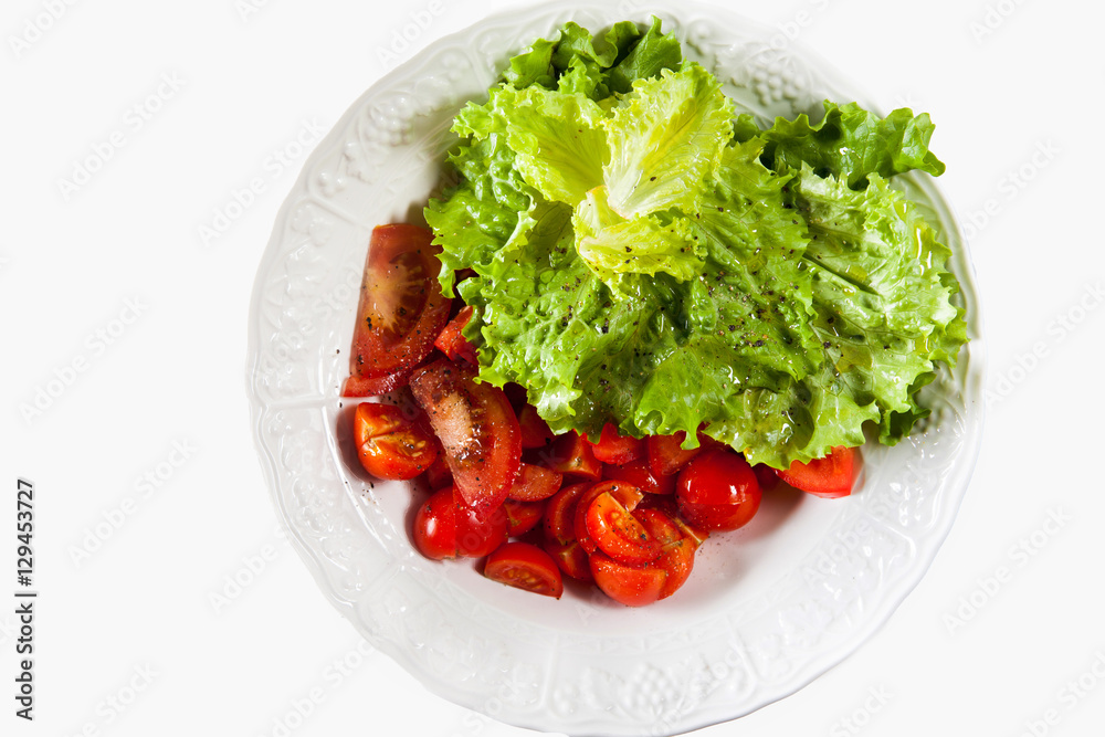 resh Lettuce and Tomatoes Salad in a bowl isolated on white resh Lettuce and Tomatoes Salad in a bowl isolated on white