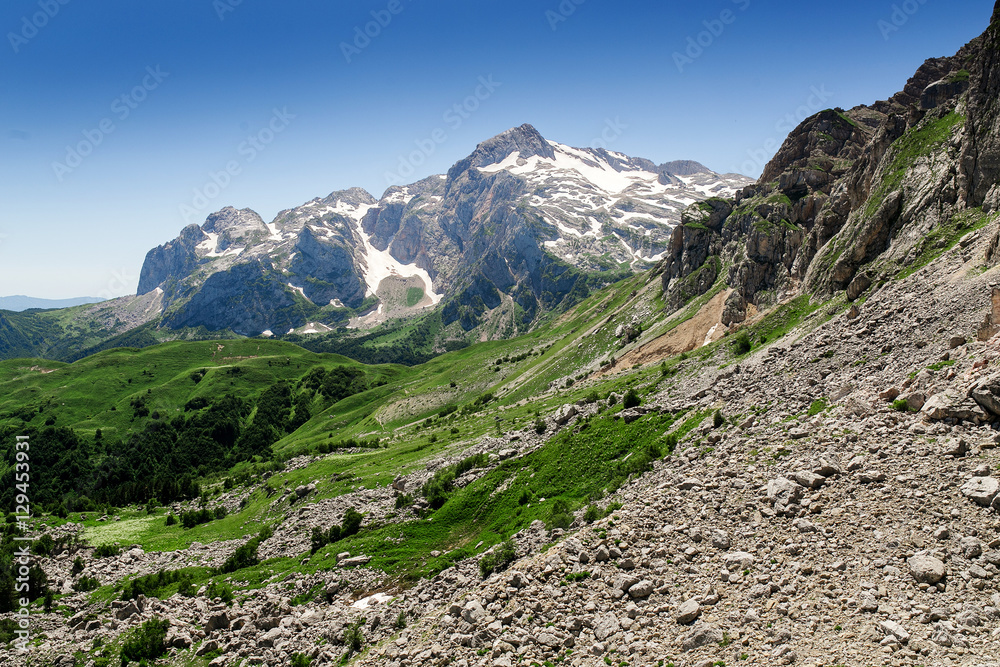 Panoramic view of Fischt mountains and alpine meadows, Russia, the Caucasus