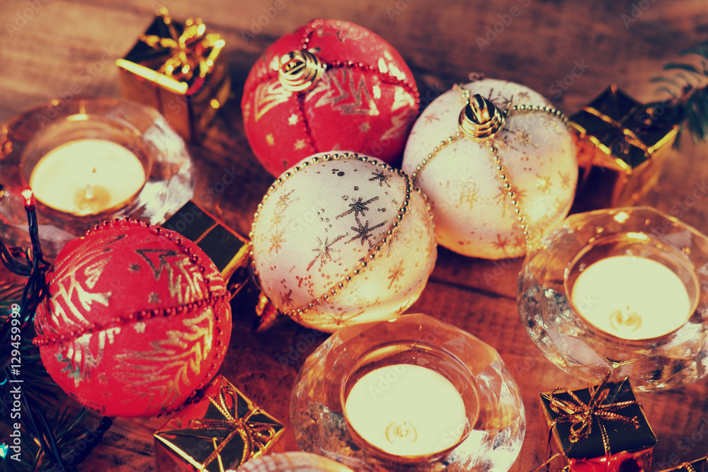 Christmas balls, gift boxes and candles 