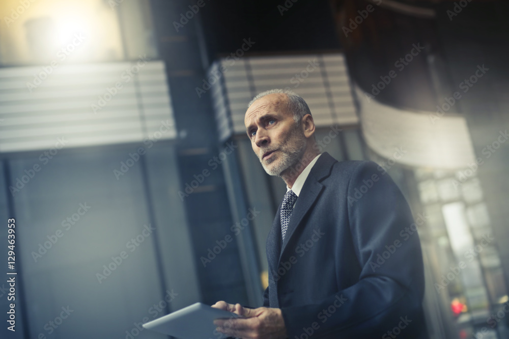 Fototapeta premium Worried businessman standing