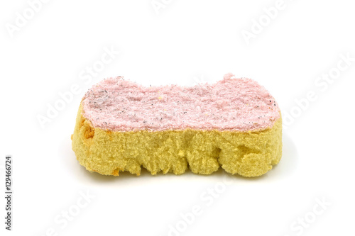 Old kitchen sponges on a white background is a longstanding and