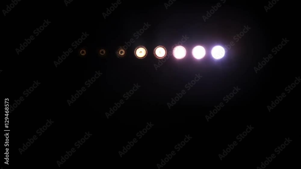 Bright Floodlights Flashing forming figures with sound. Amber-Blue. 