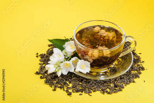 Cup of jasmine tea with flowers