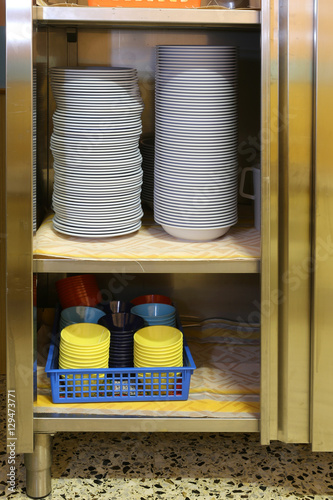 many plates and bowls in the refectory