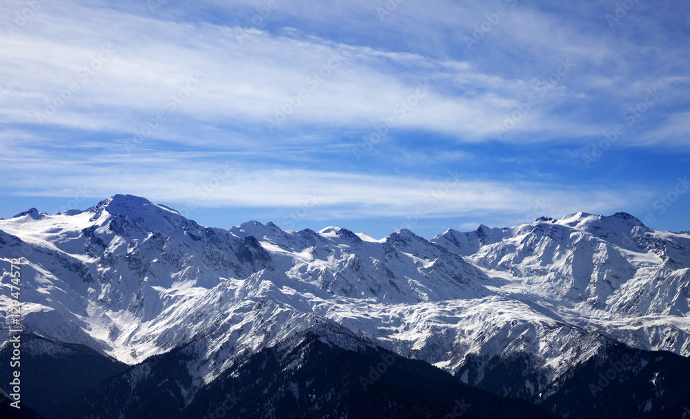 Sunlight snow mountain in wind winter evening Sunlight snow mountain in wind winter evening