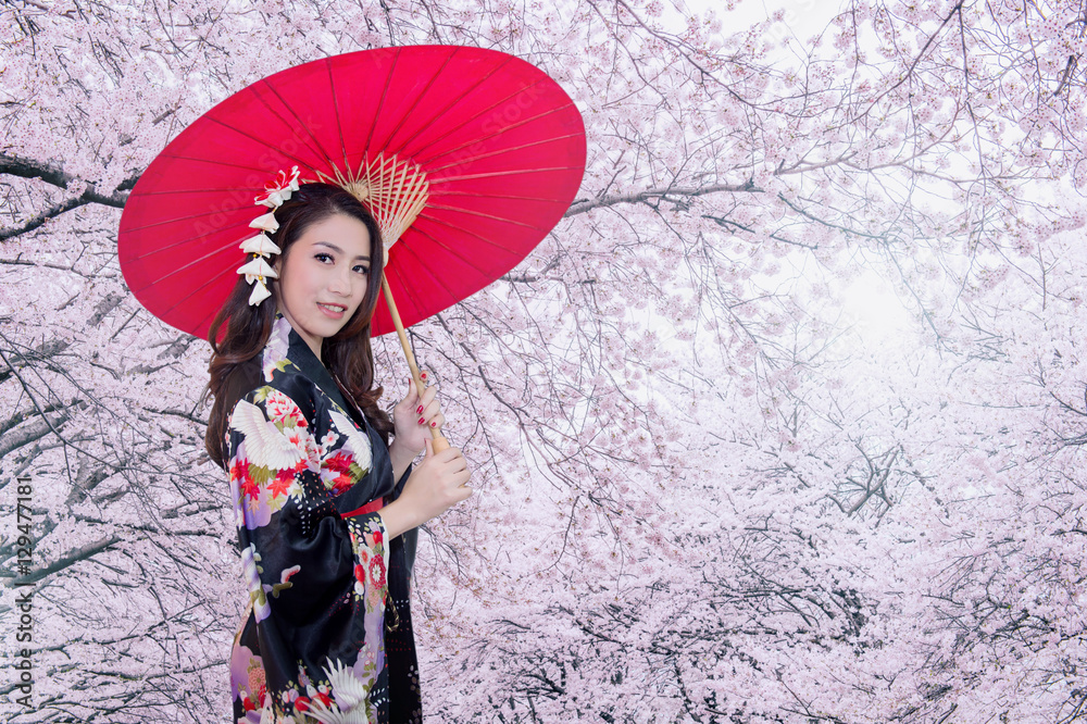 Fototapeta premium Beautiful young asian woman wearing traditional japanese kimono