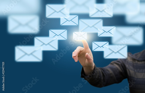 Businesswoman sending letters to