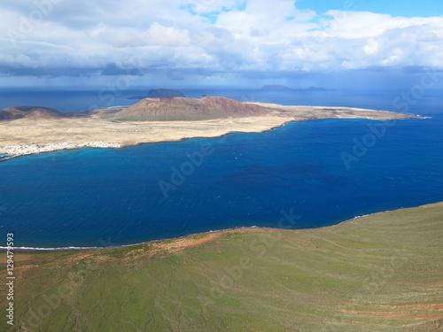 View of  La Graciosa  Island from Lanzarote  Canary Islands  Spain . The picture was taken from the gazer known as  Mirador del Rio 