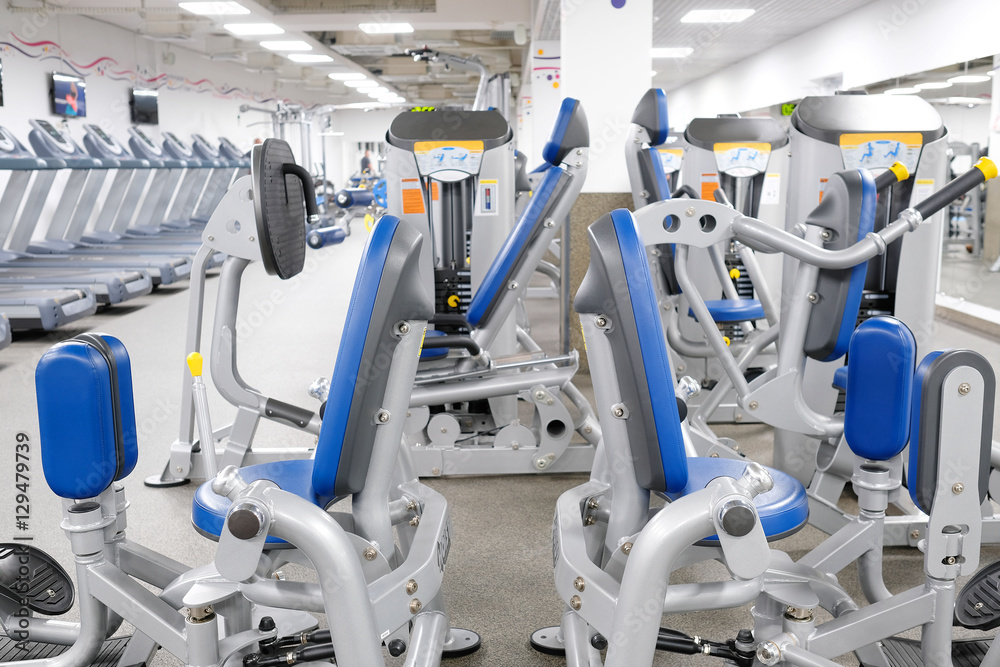Interior of a fitness hall with fitness equipment Interior of a fitness hall with fitness equipment
