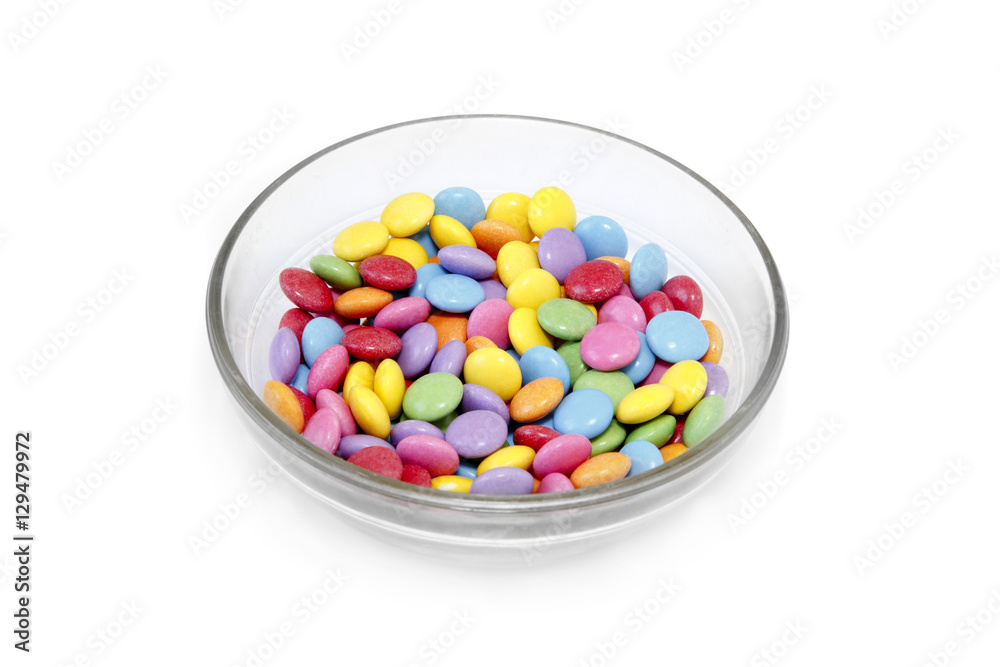 Bright colorful candy in glass bowl