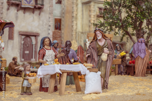 Nativity scene with hand-colored wooden figures