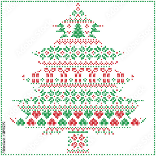 Scandinavian Nordic winter stitching  knitting  Christmas pattern in  in Christmas tree  shape  including snowflakes, hearts Xmas trees Christmas presents, snow, stars,  ornaments in red and green 
