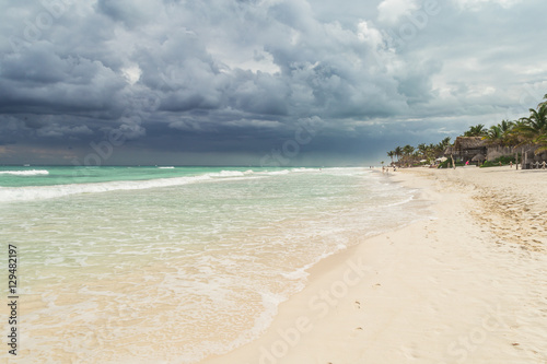 Fototapeta Naklejka Na Ścianę i Meble -  Beautiful beach. Storm sky over the sea Tulum, Mexico, Carribean