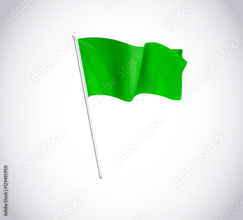 Green flag on flagpole isolated on white background.  Flag flyin photo