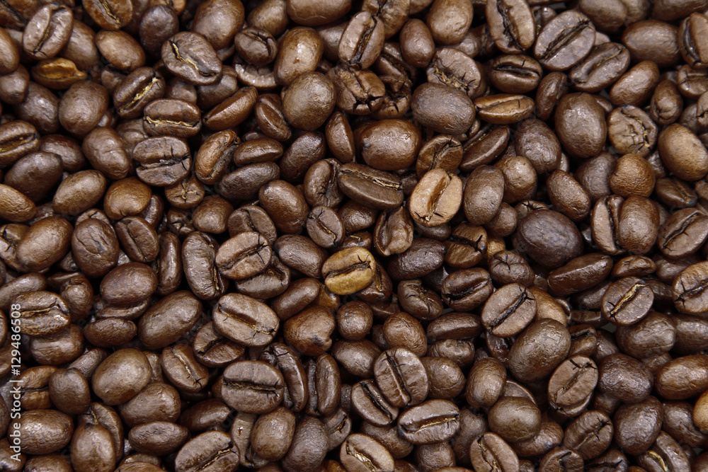 Brown roasted coffee beans background Brown roasted coffee beans background