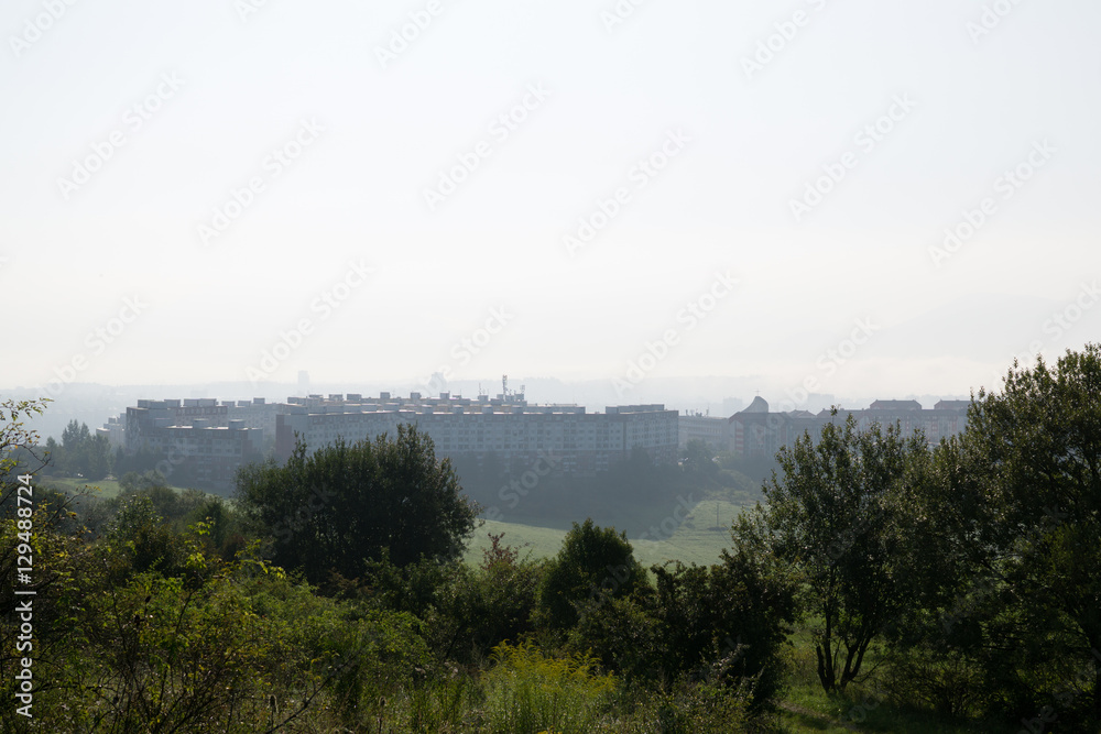 Misty morning with the view on the fog over the city. Slovakia