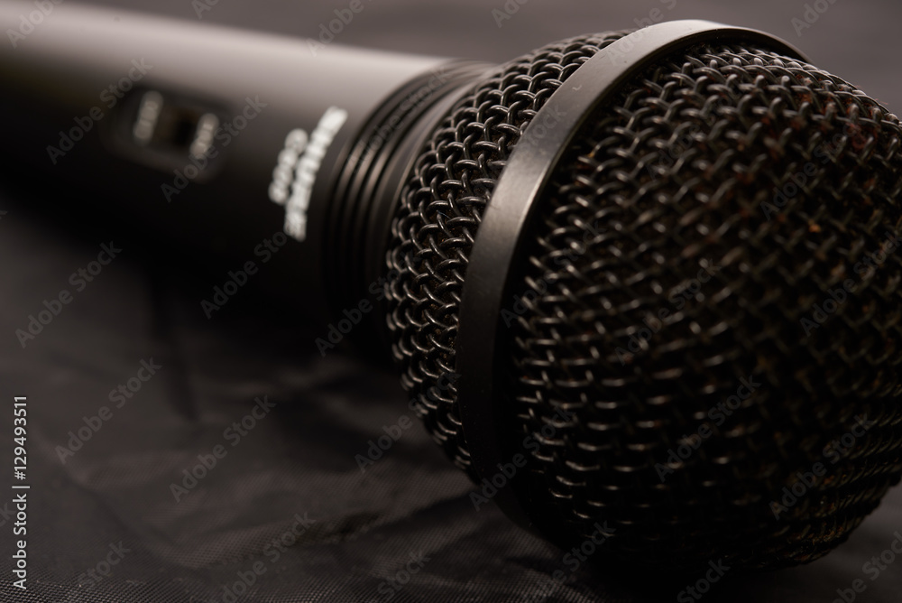 Black microphone closeup Black microphone closeup