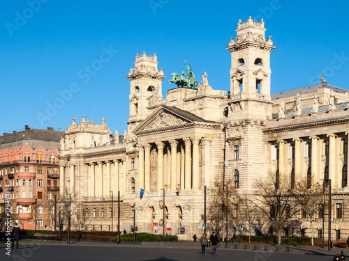 Hungarian National Museum of Ethnography, aka Neprajzi Muzeum, at Kossuth Lajos Square in Budapest, Hungary, Europe. View of entrance portal with two towers and architectural columns on sunny day with © pyty