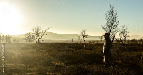 Male hunter with gun, Finland  photo