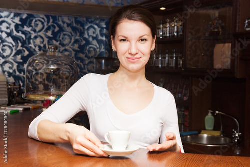 young girl made coffee