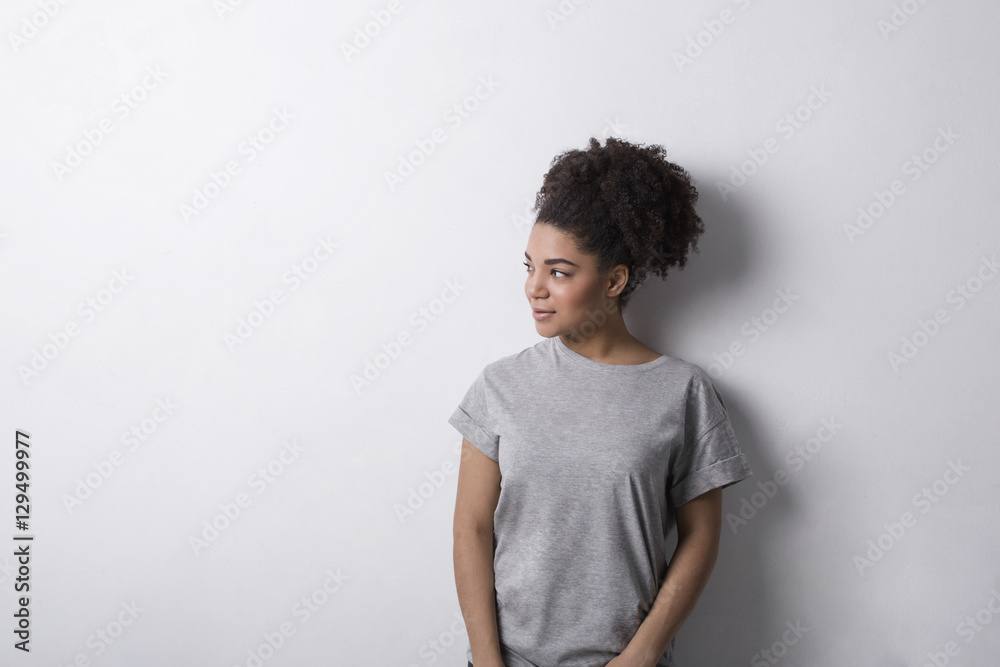Young female leaning against wall Young female leaning against wall