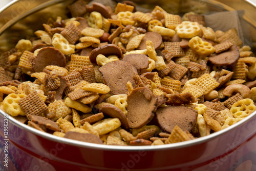 Chex mix in holiday tin