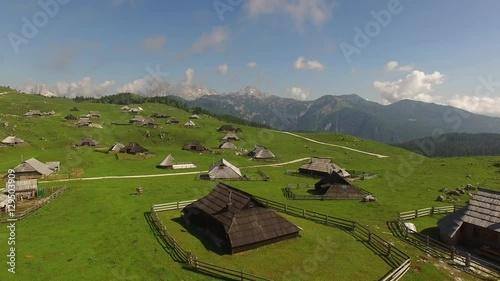 Aerial View Of Mountain Village With Mountain Alps Background At Summer
