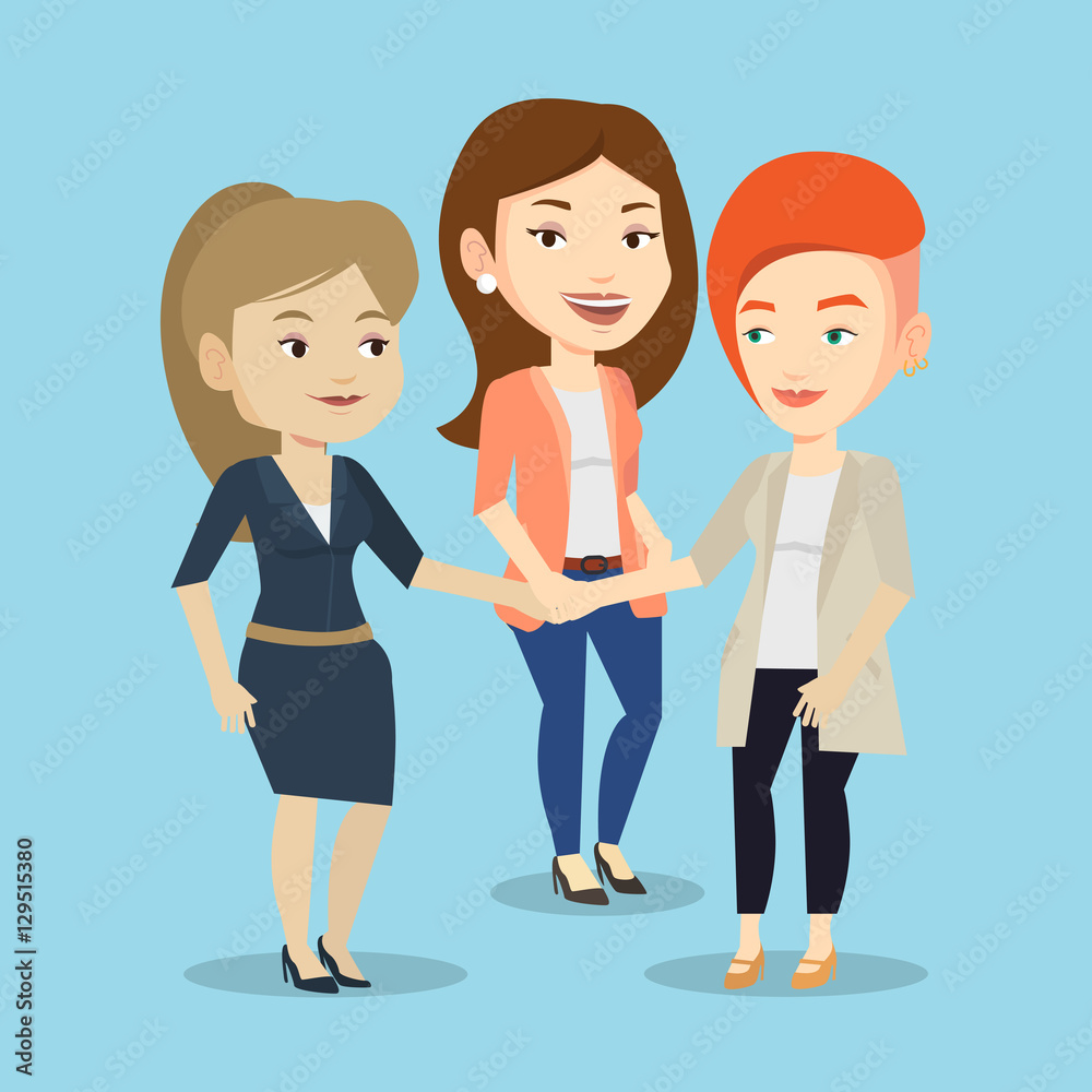 Obraz premium Group of business women joining hands.